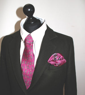 100% Silk Twill Tie in Purple Bird Pattern.
